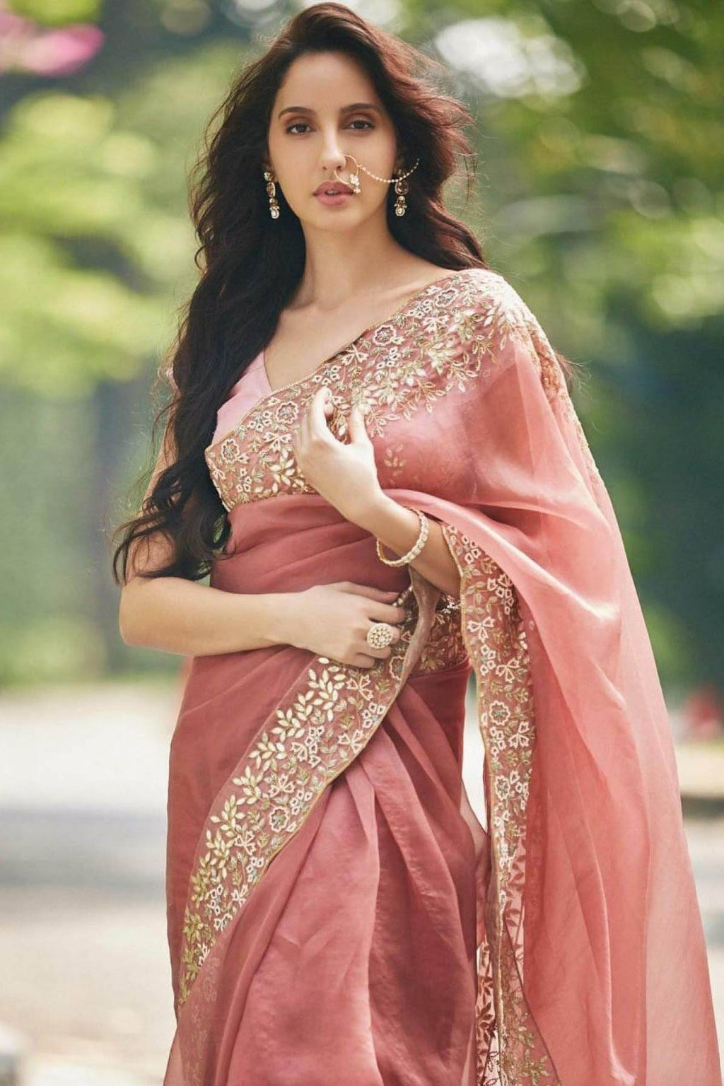 https://www.devnaagri.com/cdn/shop/products/nora-fatehi-in-burgundy-saree-with-raw-silk-blouse-celebrity-devnaagri-925092_1024x.jpg?v=1596512619